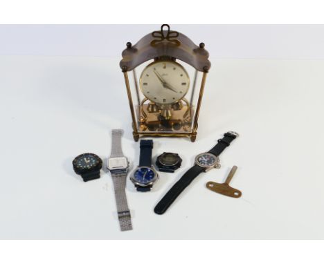 A small collection of watches to include Casio, Pod and other and a Schatz anniversary clock. [W]