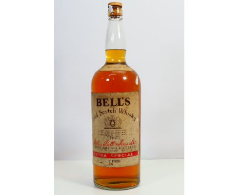 A vintage 8 Pints bottle of Bells Extra Special whisky, 70° proof, likely a 1970's bottling. [W]