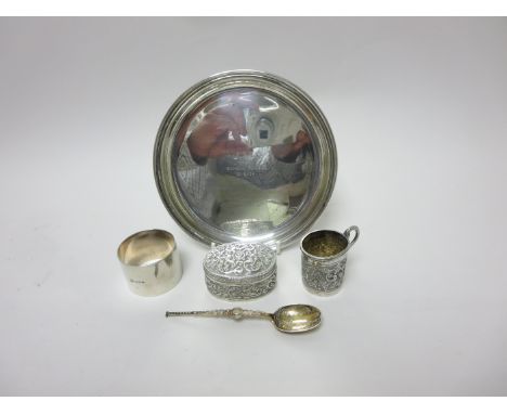 A George V silver small Salver engraved initials, London 1929, a Napkin Ring, Birmingham 1933, Spoon, 1937, Indian silver ova