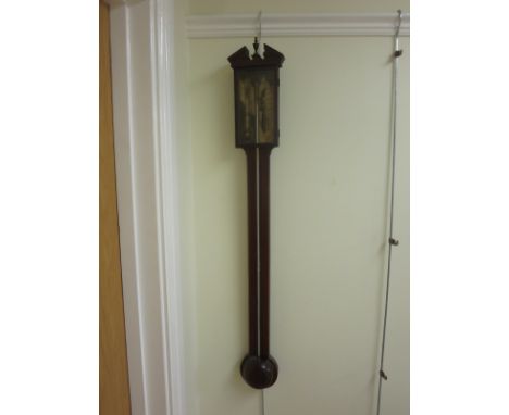 A 19th Century mahogany and inlaid Stick Barometer with architectural broken arch pediment and urn finial, 36in L