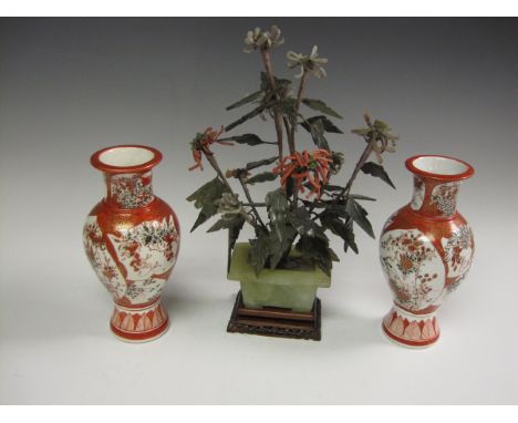 A pair of Japanese Satsuma baluster Vases, having panels of flowers and gilt decoration and a hardstone and coral Tree Decora