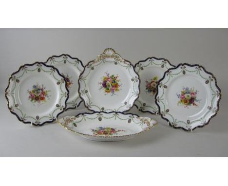 A Royal Worcester part Dessert Service painted floral bouquets in swagged border with blue and gilt rim, viz: four plates 8 1