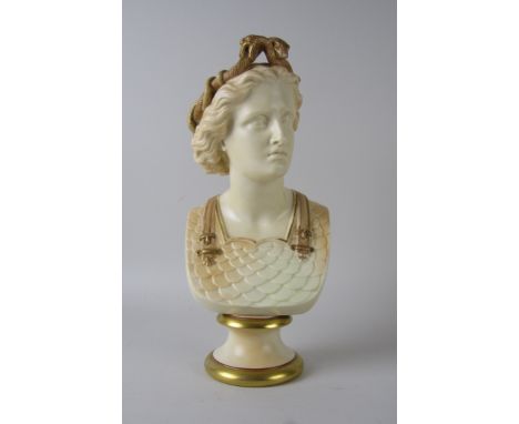 A Royal Worcester classical Bust of 'War', a young warrior clad in armour with crown of vipers, gilt detail on blush ivory gr