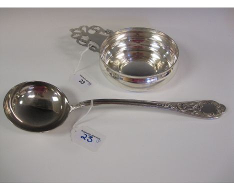 A Tiffany & Co silver heavy Porringer with single pierced flat section handle and a Continental silver Soup Ladle kings patte