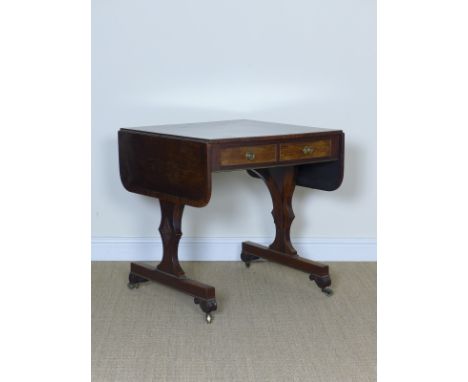 A Regency rosewood Sofa Table of small proportions fitted two frieze drawers on cheval base and having gilt rope twist applie