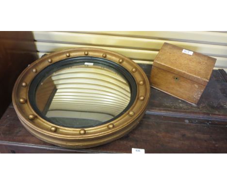 A gilt framed Convex Wall Mirror with ball applied frieze, 23in and a light oak Stationary Box, 10in