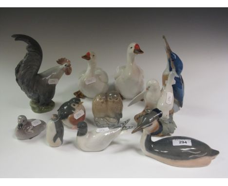 A Royal Copenhagen Grebe No 3263, Kingfisher No 126, pair of Owls, 1221, pair of Doves, Seagull 1468, Penguin 3003, Robin, Co