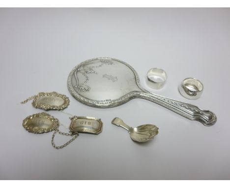 A George IV silver Caddy Spoon fiddle pattern engraved initials, London 1822, a silver framed Hand Mirror, Chester 1920, thre