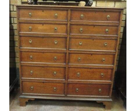 A 19th Century oak Chest of twelve narrow drawers on bracket feet, 3ft 6in W x 1ft 6in D