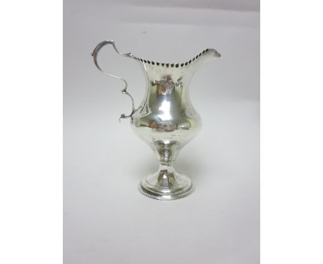 A George III silver helmet shape Cream Jug engraved initials on pedestal base, London 1783, maker: Hester Bateman