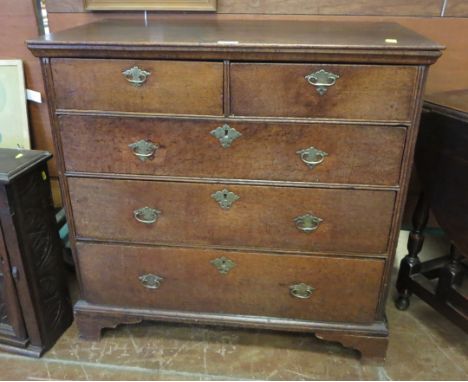 A 19th Century oak Chest of two short and three long drawers with panelled sides on bracket feet, 3ft 2in W x 1ft 10in D