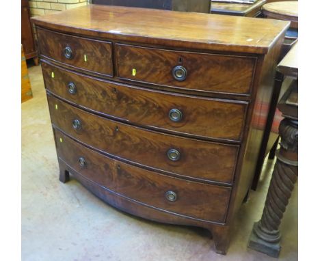 A 19th Century mahogany bow front Chest of two short and three long drawers on splay bracket feet, 3ft 6in W