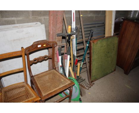 A quantity of long handled gardening tools etc 