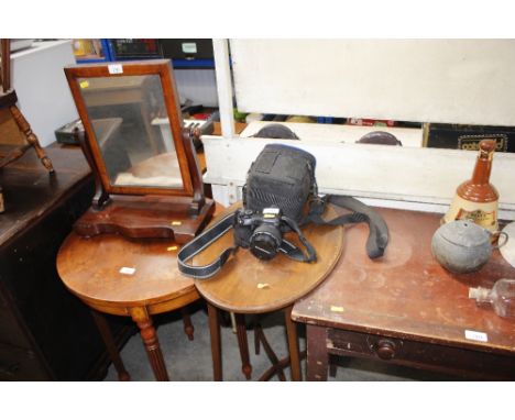 An Olympus digital camera and carrying case
