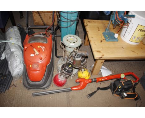 A greenhouse heater; two Tilley lamps and a blow lamp 