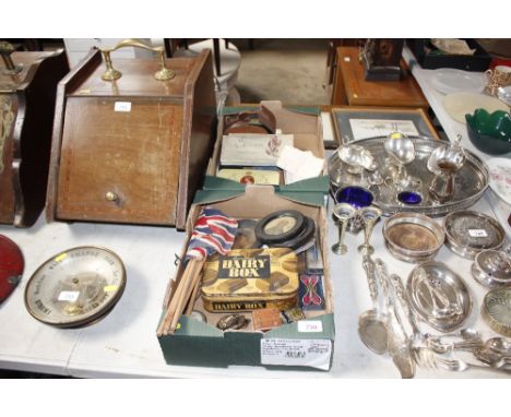 Two tray boxes of various items to include small brass door knocker decorated with a bloodhound; cutthroat razors; a voltage 