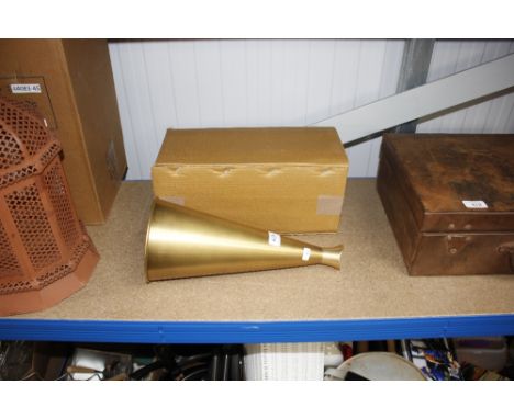 A brass megaphone 