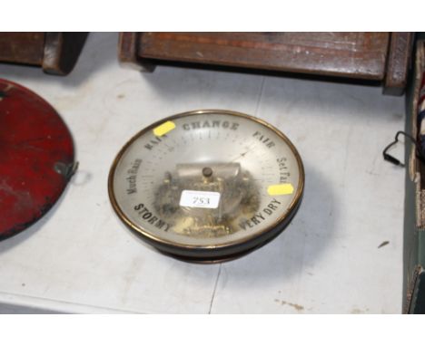 A brass cased barometer  