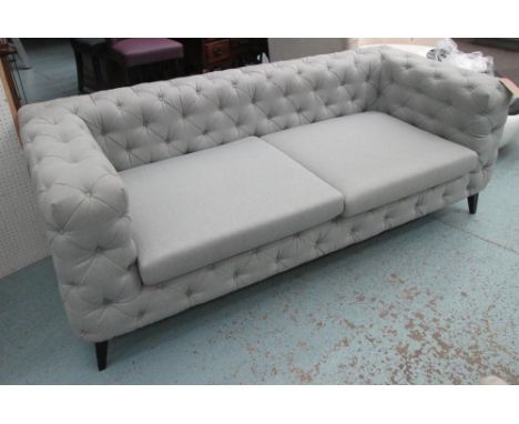 SOFA, in buttoned grey fabric, 92cm D x 77cm H x 212cm L.