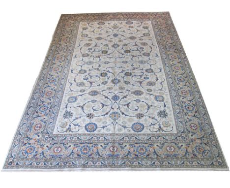 FINE KASHAN CARPET, 386cm x 266cm, all over Shah Abbas palmette design with scrolling vines on an ivory field within multiple