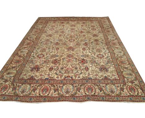VINTAGE TABRIZ CARPET, 385cm x 285cm, all over stylised palmette and vines on an ivory field within a repeat palmette main bo
