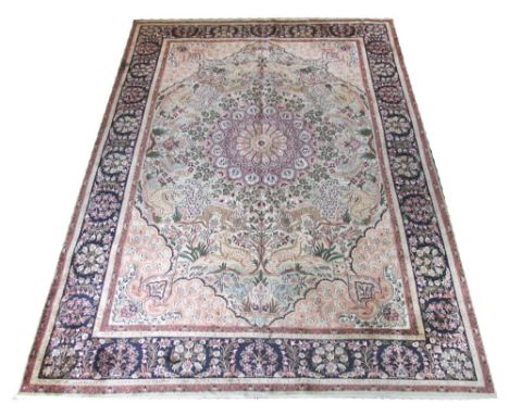 KASHMIR PURE SILK RUG, 273cm x 187cm, central medallion on a jade field of hunting scenes and foliage inside multiple corresp