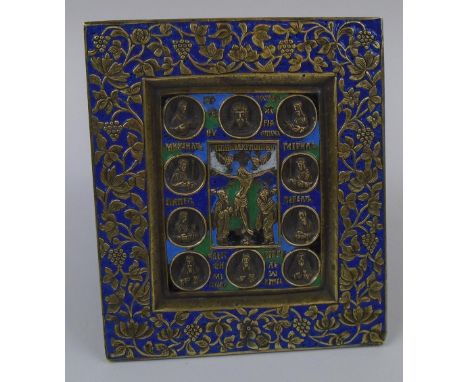 BRASS PLAQUE ICON, with blue enamel highlights, 10.25cm H x 8.75cm W.