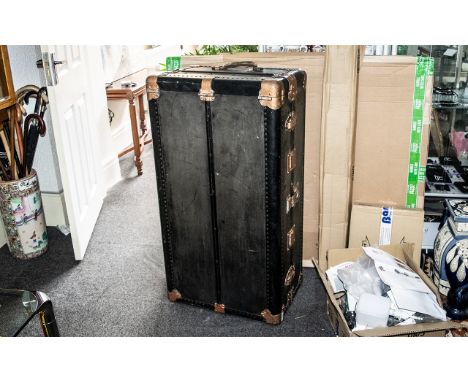 A Steamer Trunk, fitted interior, metal strapwork mounts, of typical form.  Measures 40" x 21" x 15" deep.  