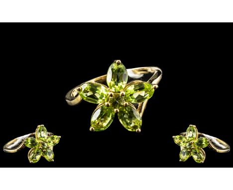 Peridot Flower Cluster Ring, five oval, luscious green peridot 'petals' totalling 2.5cts, surround a small central peridot, s