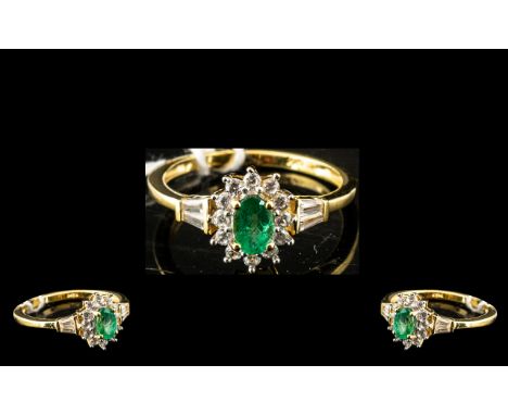 Emerald Solitaire Halo Ring, an emerald of the most beautiful colour, oval cut and measuring .5ct, with a halo of round cut, 