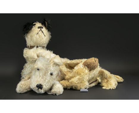 Collection of Three Vintage Dog Pyjama Cases, comprising: small Spaniel dog straw filled with glass eyes and zip on back; Ter