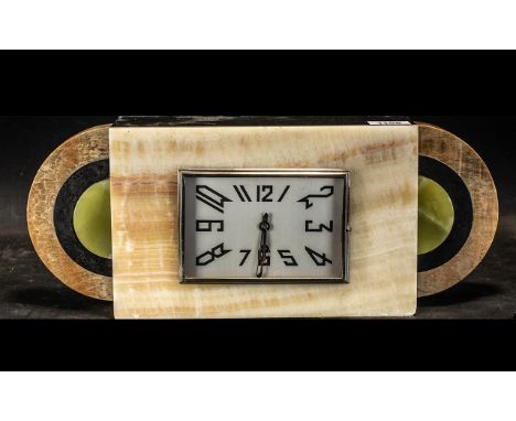 Art Deco Mantle Clock with rectangular dial, Arabic numerals, with chrome cover, lacking glass.  The side of stepped circular