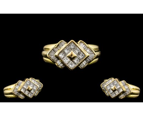 18ct Yellow Gold - Attractive Princess Cut and Baguette Cut Diamond Set Ring of Excellent Contemporary Design. Diamond Weight