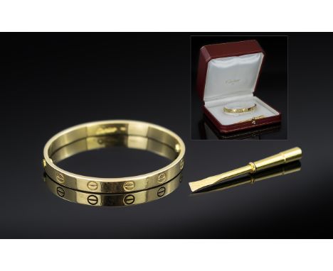 Cartier 18ct Yellow Gold 'Love' Bangle, Decorated with screwhead motifs, signed Cartier and numbered 798917, stamped 750 (Siz