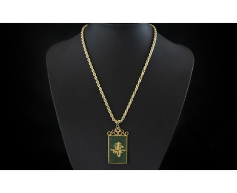 A Hong Kong Jade Pendant in base metal suspended with a 14ct Gold Hollow Rope Chain 16 inches in length. chain 6.4 grams