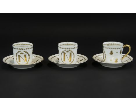 Antique Sevres Porcelain Set of Three 'Napoleon' Coffee Cans and Saucers with the symbolic N and bees in gilt; fully marked t