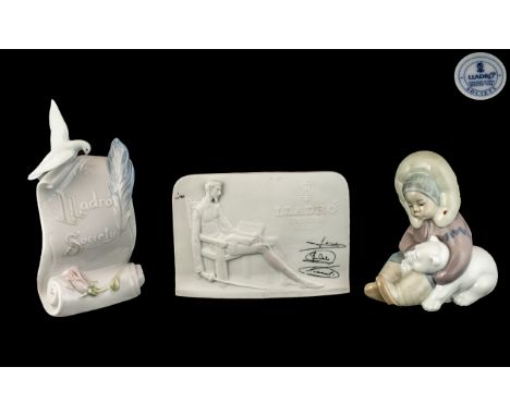Two Lladro Plaques, one signed Lladro Collectors Society white plaque, and one glazed Lladro Society plaque with a dove and f