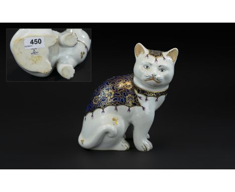 Royal Crown Derby Porcelain Figurine of a Cat, white with decorative blue and gilt cloak and headdress.  Marks to base.  Meas