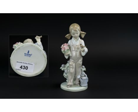 Lladro Hand Painted Porcelain Figure 'Spring', model no.5217, designer Juan Huerta, issued 1984, 7.5 inches (18.75cms) high, 