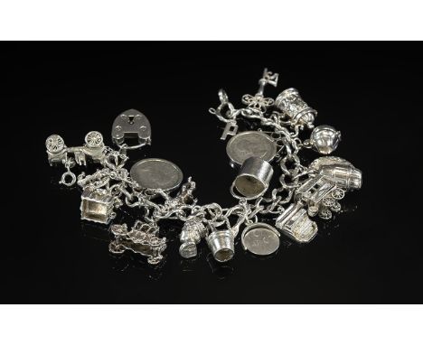 Excellent Quality Vintage Sterling Silver Charm Bracelet - Loaded with 17 Sterling Silver Charms. Both Bracelet and Charms Ma