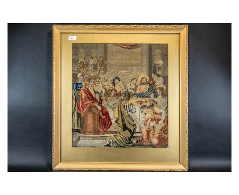 Berlin Work Tapestry of Jesus at the Last Supper, housed in a gilt frame and glazed; overall size 32 inches (app.80cms) x 36 