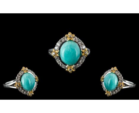 Amazonite and White Zircon Halo Ring, two natural stones, the blue amazonite mined in Peru, the zircon mined in Cambodia, bro