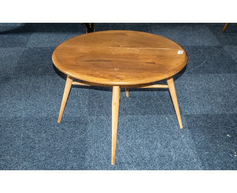 A Golden Dawn Ercol Drop Leaf Coffee Table. 60 Inches High, 40 Inches Wide &amp; 60 Inches Deep. Pebble Shaped. 