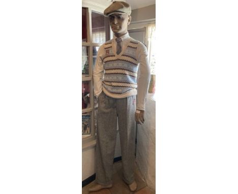 Original 1930s mannequin from Ashbourne department store on glass base, rubber hands have wear, dressed in vintage clothing a