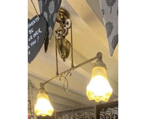 Vintage brass light fitting. Rise and fall pulley system, two glass shades .very good condition. Please study pictures.