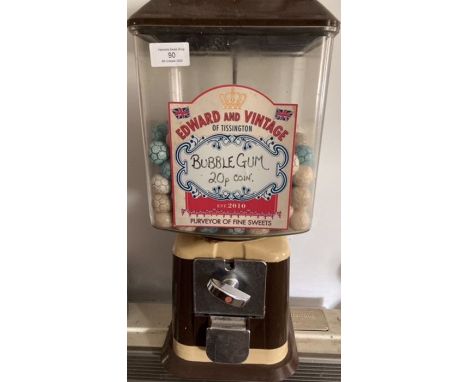 Vintage coin operated bubble gum vending machine