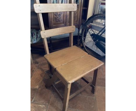 Vintage wooden chair converging to steps. Good condition.