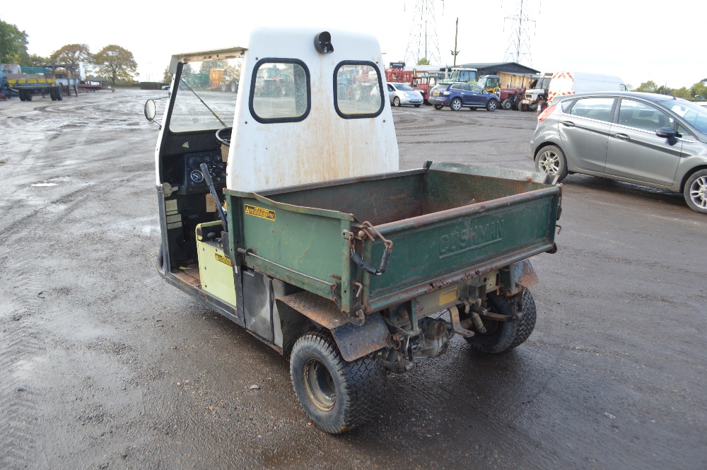 Cushman Truckster 3 wheel utility vehicle. With hydraulic tipping buck