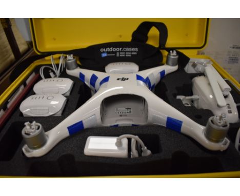 A DJI Phantom 4 camera drone in hard outdoor case