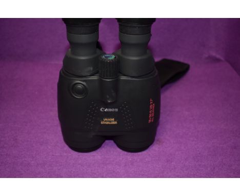 A pair of Canon Image Stabilizer 18x 50 IS all weather binoculars in original box with soft carry bag and user manual
Very go